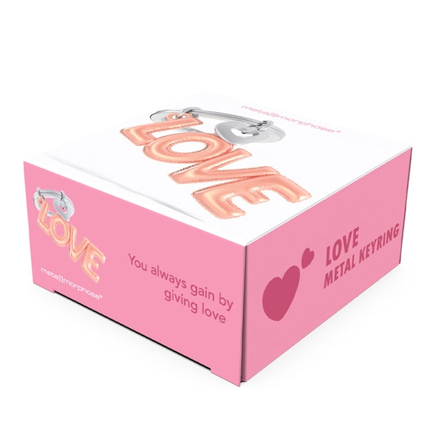 Metalmorphose.lt metalinis raktų pakabukas MEILĖS BALIONAS. Rausvas širdies baliono tipo metalinis raktų pakabukas su tikroviškomis raukšlėmis. Premium metalas. MEILĖS PASAULIS kolekcija.