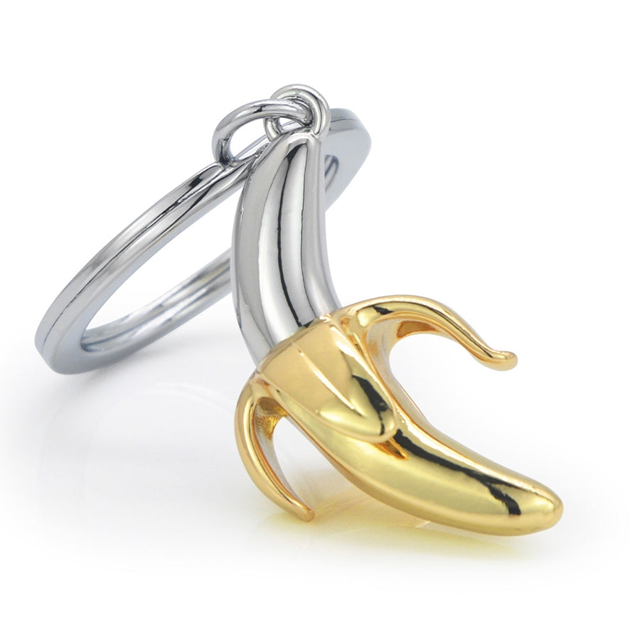 Metalmorphose.lt metalinis raktų pakabukas „Auksinis Bananas“ – auksinio banano 3D miniatiūra iš Skonių Pasaulis kolekcijos.