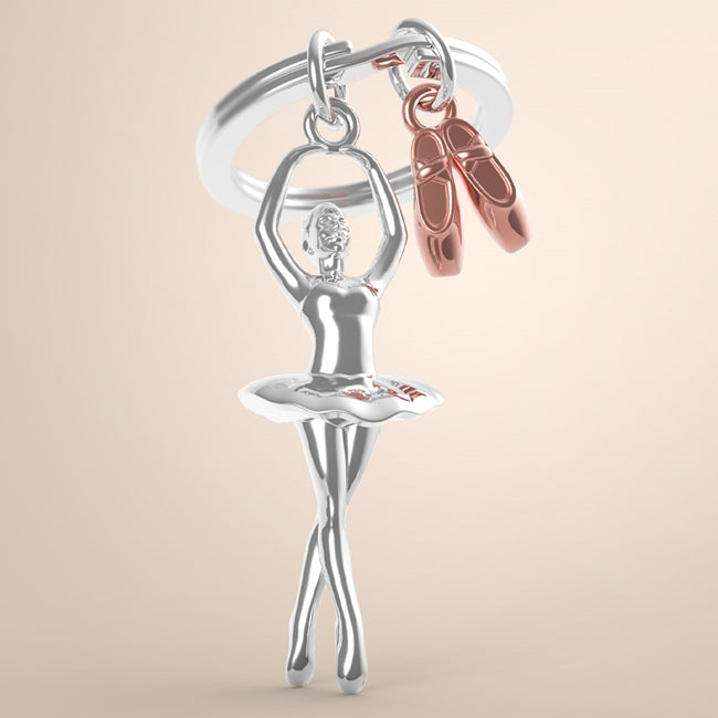 Metalmorphose.lt metalinis raktų pakabukas BALERINOS PASLAPTIS. 3D balerina ir rožinio aukso baleto bateliai, detalus cinko lydinio dizainas, plieno žiedas. SPORTO PASAULIS kolekcija.