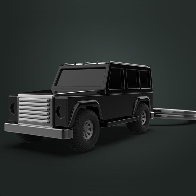 Metalmorphose.lt metalinis raktų pakabukas GALINGASIS G-WAGON. Tvirtas 3D visureigis su reljefiniu kėbulu ir judančiais guminiais ratais. TRANSPORTO PASAULIS kolekcija.