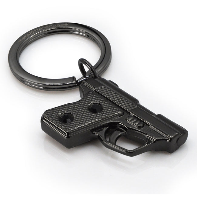 Metalmorphose.lt metalinis raktų pakabukas GANGSTERIO VAMZDIS. Premium cinko lydinio metalas, šampaninė-nikelio apdaila. Pistoletas miniatiūra. Plieninis žiedas. Raktų pakabukas iš KASDIENYBĖS PASAULIS kolekcijos.