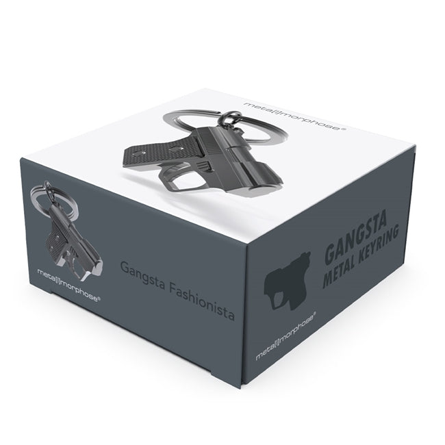 Metalmorphose.lt metalinis raktų pakabukas GANGSTERIO VAMZDIS. Premium cinko lydinio metalas, šampaninė-nikelio apdaila. Pistoletas miniatiūra. Plieninis žiedas. Raktų pakabukas iš KASDIENYBĖS PASAULIS kolekcijos.