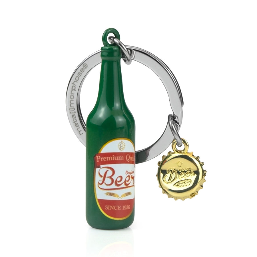 Metalmorphose metalinis raktų pakabukas „Gurmaniškas Alus“ – alaus butelio su auksiniu kamšteliu 3D dizainas, premium dovana iš Skonių Pasaulis kolekcijos.