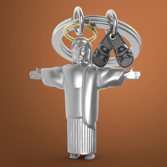 Metalmorphose.lt metalinis raktų pakabukas JĖZUS KRISTUS. Detalus Jėzaus atvaizdas ir juodi sandalai. Premium simbolinė miniatiūra iš SIMBOLIŲ PASAULIS kolekcijos.