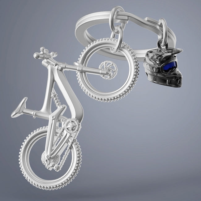 Metalmorphose.lt metalinis raktų pakabukas KALNŲ LAISVĖ. 3D metalinis kalnų dviratis su amortizatoriais ir bekelės padangomis, juodas sportinis šalmas. Premium cinko lydinys. SPORTO PASAULIS kolekcija.