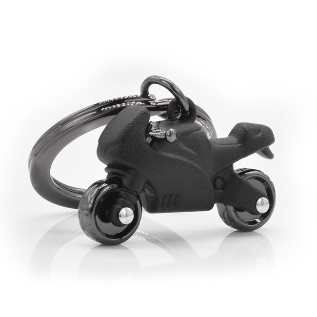 Metalmorphose.lt metalinis raktų pakabukas MATINĖ MOTOCIKLO SIELA. Matinis juodas Superbike motociklas su besisukančiais ratais ir detaliu metaliniu juodu matiniu kėbulu. TRANSPORTO PASAULIS kolekcija.