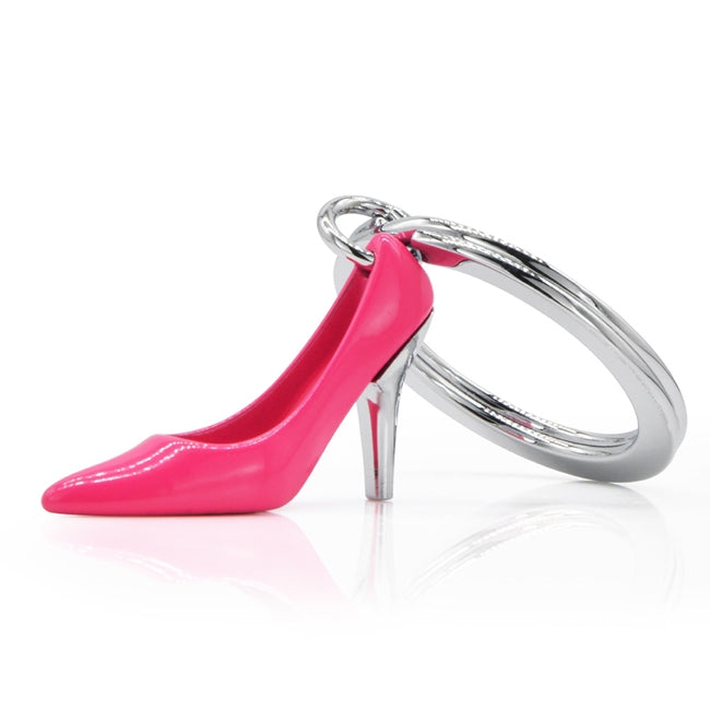 Metalmorphose.lt metalinis raktų pakabukas ROŽINIS AUKŠTAKULNIS. Tvirtas metalinis korpusas, nudažyta rožinė detalė, ikoniško aukštakulnio 3D miniatiūra. Nerūdijančio plieno žiedas. Pakabukas iš KASDIENYBĖS PASAULIS kolekcijos.