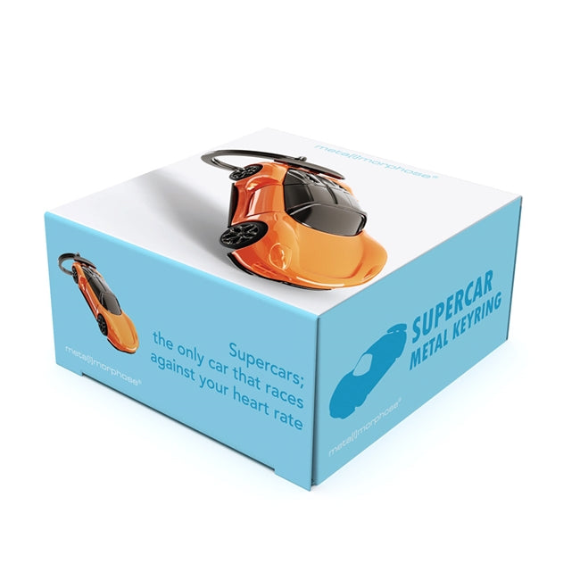 Metalmorphose.lt metalinis raktų pakabukas RYŠKUSIS SUPERAUTOMOBILIS. Ryškiai oranžinis superautomobilis su juodu stogu, tamsintais langais ir besisukančiais ratais. TRANSPORTO PASAULIS kolekcija.